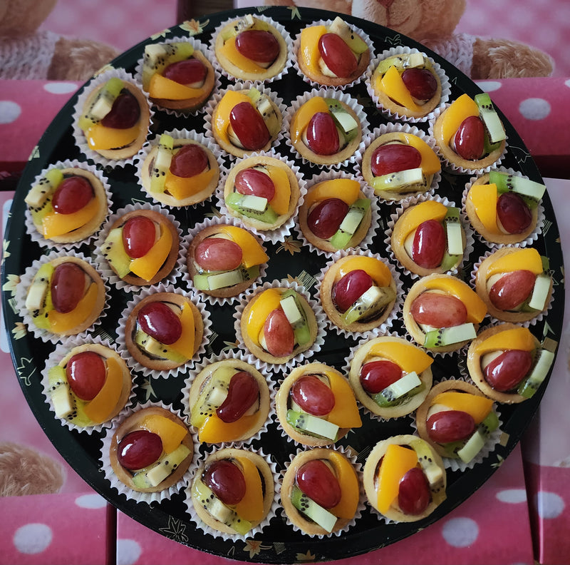 Mini Fruit Tarts on sharing platter